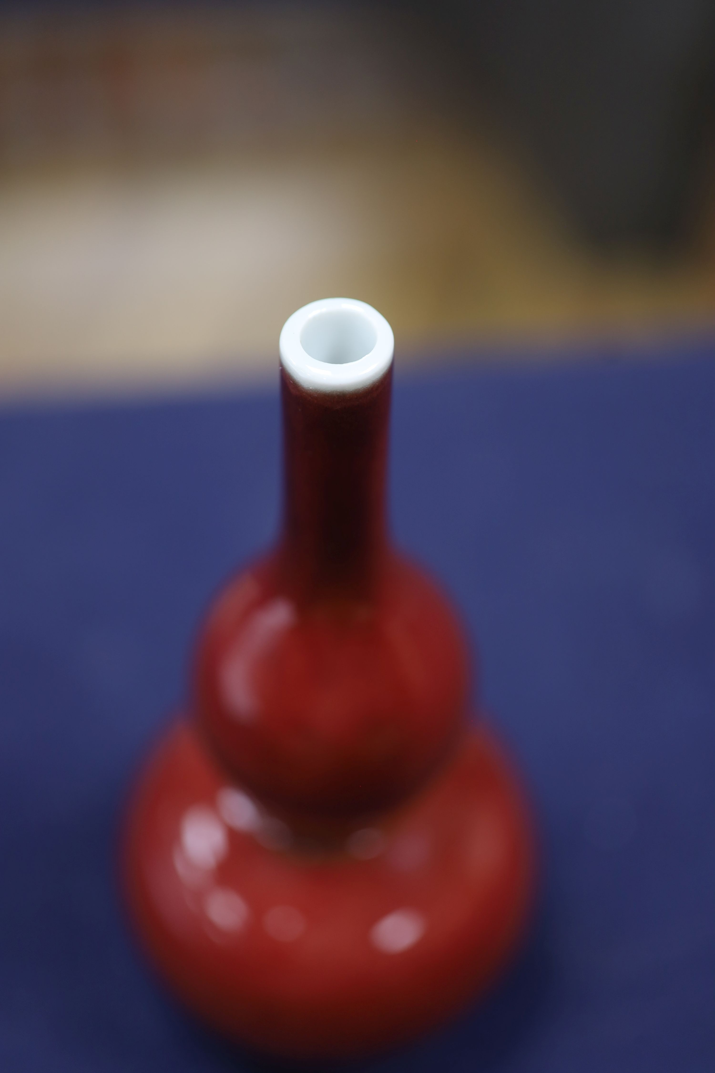 A Chinese copper red glazed double gourd vase, height 17cm